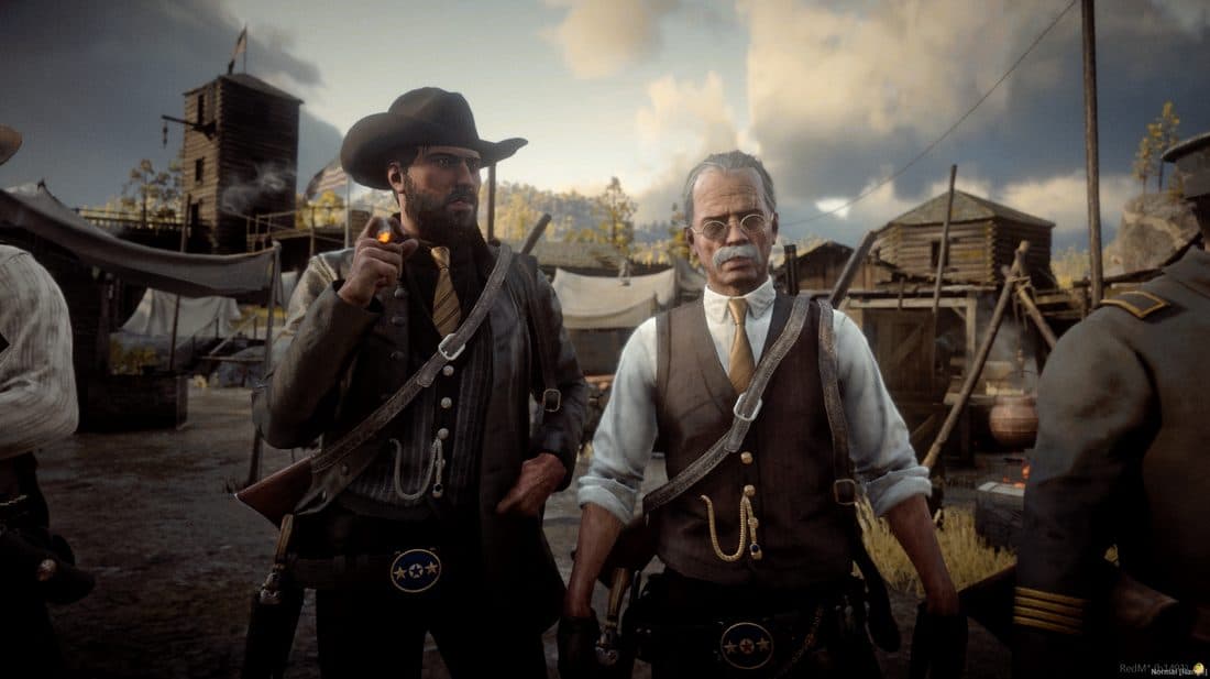 Two well-dressed lawmen standing in a camp, one lighting a cigarette